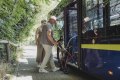 Rollator being used to go onto a bus 