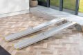Extendable ramps resting on step 
