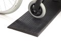 Wheel on rubber threshold ramp 