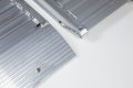 Pair of aluminium loading ramps  close up image 