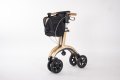 Gold rollator folded 