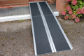 Suitcase ramp on threshold 
