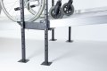 Joining support to connect two wheelchair ramps 