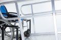 Wheelchair ramp with handrails joining support 