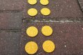 Yellow discs on steps 