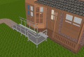 3m modular ramp kit with handrails outside a home 