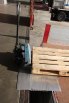 Loading bridge with pallet truck 